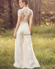 Modern Beach Jumpsuit a-line Wedding Dresses High Neck Short Sleeves Lace Appliques Garden Bridal Dress Pant Suit