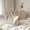 Сумки Ins Korean Baby Bead Bags Многофункциональные большие мощности Canvas Maternity Mommy Bag Bead Bear Emelcodery Bag Organizer