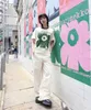 Marimekko 2024 sommar ny kvinnors mode personlighet unikko blommor tryck t-shirt mångsidig ren bomull lös o-hals kort hylsa t-shirt
