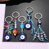 Keychains Lonyards cristal coloré dinde bleu œil perle ke clés clés anneau femmes hommes uniques lucarneux mal œil sac de voiture support de voiture clés accessoires y240417