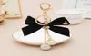 Keychains Elegant Ribbon BowKnot Crystal Ball Crown Keychain For Women Girl Cute Pompom Fur Key Chain Bag Charms Keyring Party Gi5210594