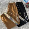 Pantalones para hombres 2024 Moda de primavera pantalones holgados machos streetwear