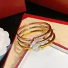 Bangle Panthere Series 18 K Gold Никогда не исчезает официальная копия ювелирных украшений высшего качества бренда роскошного бренда Bangles Classic Style Bracelet Высший C Dhzya