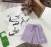 Fashion Baby Tracksuit Summer Girls Suit à manches courtes Suit des enfants Vêtements de créateurs Taille de 100-160 cm Poll Bear Print et Shorts violets 24Pril