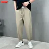 Abiti da uomo 2024 pantaloni traspiranti estivi per uomo streetwear liscia una gamba dritta versatile casual