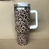 Tazze da 40 once di tazze di design con vacca leopardo avventura vecchia design di fiori di fiore maneggevano coperchi e cannuccia tazze per auto a vuoto bottiglie di acqua potabile isolata