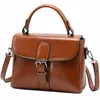 2024 Edição coreana feminina Casual Postman Bag Trendy One ombro diagonal Straddle Cowhide Versátil