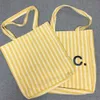 Lotte Japan Южная Корея AP вертикальная полоска для покупок ручной сумки для одиночного плеча мужское и женское ручное пакетик 240419