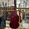 Guitarra elétrica chinesa, braço de pau-rosa, corpo de mogno, top de bordo de tigre, captação de zebra, guitarra de 6 cordas à direita