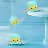 Sand Play Water Fun Cute Cartoon Animal Inertial bläckfisk Crawling Sea Animals Barn som leker i vatten och Clockwork Beach Bath Toys L416