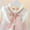 Robes de fille neuves au printemps pour tout-petit robes de fille coréenne mode coréen mignon arc maille plaid à manches longues princesse enfants robe de bébé tenue bc464 d240423