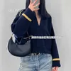 South Oil Womens Korean Color Contrast Pullover V-neck Knitted Long Sleeved Autumn New Loose Wool Top