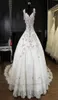 2018 Winter Fall Snow Garden Ball Gown Cap Shoulder Wedding Dresses Crystals Western Bridal Wedding Gowns3703550