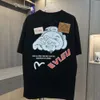 Fu Shen T-shirt för män och kvinnor, ny till hjärtbuddha huvud, liten m tryck, stilig social ande, ung man lös kortärmad topptrend 779527