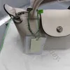 Tote Store Clearance grossist 95% rabatt på läderväska en huvudmaterial dumpling mini crossbody handväska lammskinn axel borsa klassisk äkta mode lyx