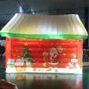 屋外アクティビティ4x3mインフレータブルサンタの洞窟は、ホリデークリスマスの装飾のためのLEDライト付きクリスマスハウスを爆破します