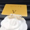 Pendientes de lujo con pendientes de marcas de lujo diseñados de lujo Pendientes de alta calidad para mujeres encantadoras de joyería de alta calidad cajas de aretes exquisitos