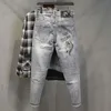 Mäns jeans manliga cowboybyxor gråa med tryckta strass beskurna byxor grafiska jeans för män lös y 2k vintage koreansk mode vinter xs t240419