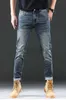 Heren jeans ontwerper Autumn Denim Men's Koreaanse versie Leggings Slim passend dikke geborduurde blauw grijs lange broek BQH762G