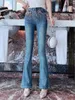 Kvinnors jeans Autumn Korean Fashion Sweet High midja Europeiska varor Lyxiga färgglada kristaller Slim Bootcut Pants Tide Tide