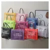 Väskor PVC Rensa stort märke Tote Bag Designer Casual Tote Mesh Axel Purses Jelly Transparenta Women Hand Bag Clutch Women