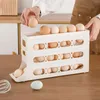Butelki do przechowywania Automatyczne jajka do uchwytu na jajka Pojemnik na lodówkę do spiżarni szafki