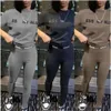 Designer Womens Tracksuits Pants Silm Stit Two pezzi Set da jogger 2024 Nuove lettere stampate Sunda per le tute a maniche corte 3 Colori Abbigliamento di moda 346436