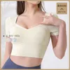 Desginer Alooo Yoga Top Shirt Clothe Short Woman Short Sleeve Cover Top med bröstkudde midja åtdragning och höftlyftbyxor Kvinnors sport T-shirt sommar