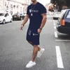 Męskie dresy 2024 Nowy zestaw odzieży sportowej męskiej garnituru Running Casual T-shirt+Shorts Zestaw oddychający do joggingu 2-częściowy zestaw dla mężczyzn T240419