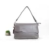 Coréen 2024 Top Layer Cowhide Small Bag pour les femmes décontractées à corps croisé minimaliste et à la mode de la datation d'achat à la mode