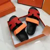 Dames heren platte hak tazz slipper chypre sandaal luxe muilezel glijbaan loafer walk schoenen zomer 10a designer schoen strand lederen sandale rubber zool oranje bodem schuifregelaars