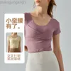 Desginer Alooo Yoga Top Shirt Clothe Short Woman Spring/Summer New Top Womens One Piece Cross Fold Sports Short Sleeve Fitness Suit med bröstkudde