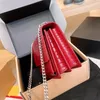 24SS Mujeres de diseño de chaqueta de chaqueta de lujo bolso de mano de mujer bolso de hombro para el hombro bolso de la noche del color sólido bolso premium exquisito 25 cm