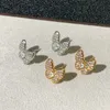 Toppdesignerörhängen Nya Vancancleff Full Diamond Faryfly örhängen med diamant inbäddade enkla och fashionabla ljus lyxörhängen