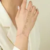 Länk armband qiamni trendiga kristallstjärna tassel handledskedja fingerringar anslutna armband unikt mode kvinnors sele armband smycken