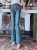 Kvinnors jeans Autumn Korean Fashion Sweet High midja Europeiska varor Lyxiga färgglada kristaller Slim Bootcut Pants Tide Tide