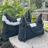 Designer Bags 2023 Lady Nieuwe Koreaanse versie All-Match Nummers Denim Crossbody Bag Senior met katoen gevoelde Down Bag