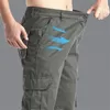 Solid Cotton Multi Flap Pockets Mens Proste nogi Spodnie LUSE Casual Outdoor Spodne Mens Pants Outdoor Streetwear 240408