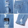 Mannen Rettery gescheurde mager fietser borduurwerk cartoon print jeans vernietigd gat slank fit denim hoge kwaliteit hiphop zwart 240415