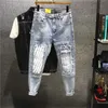 Jeans en jean masculin pour hommes pantalons de cowboy pour hommes noirs avec des trous fracturés cru