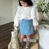 Детская одежда девочек юбка 2024 весна и летняя мода детское корейское стиль а-линия повседневная джинсовая джинсовая ткань 240516