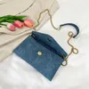 Denim blauwe schoudertassen vrouwen ontwerp ketting strip crossbody tas werk studie straattas portemonnees onderarm kleine handtas