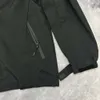 ハードシェルストームジャケットデザイナージャケット男性女性刺繍カーディガンコートトレンディな屋外風力防止防水性フード付きジャケットアジアサイズM-4XL