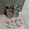 Casos de telefone celular adequados para 15 padrões 12 pulseira 11Promax 14Promax Water Diamond Case Trendy Womens H240419