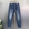 Heren jeans ontwerper Little Monster Light Luxe Europese goederen Blauw 3D -geprinte Wash veelzijdige elastische slanke fit kleine rechte poots broek 25nn