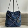 Mini sac de godet denim Sac fourre-tout de chaîne métallique vintage.