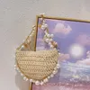 Богемный жемчуг соломенная сумка раковина женские сумочки для полуны пляж пляж Дизайнер пакетов Раттана мешки с поперечным телом дамы 240415