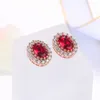 Pendientes de sementales Classic Red Crystal Pendiendo para mujeres Moda Rose Gold Color Fashion Cz Stone Jewelry Brinco Dwe108