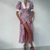 Basic Casual Dresses Summer Ladies Elegante knop Slit Lange rok V-hals Floral Fashion Retro Puff Sleeve Dress Sexy Print Beach Jurk 240419