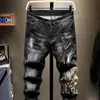 Jeans para hombres Jeans para hombres Pantalones recortados con pantalones de vaquero masculinos de hip hop negros estampados